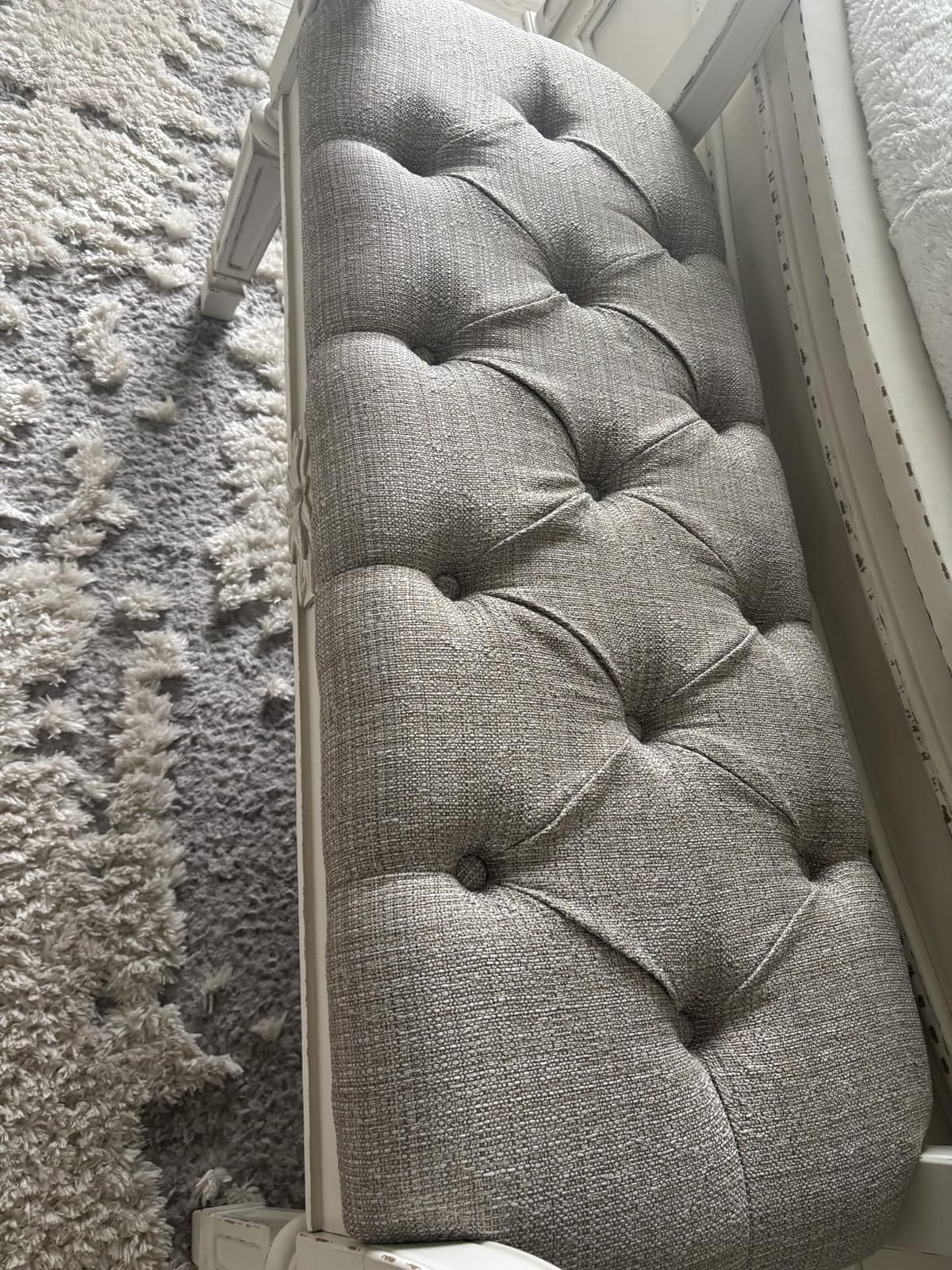 Signature Design by Ashley Realyn Upholstered Accent Bench, Antique White | 100% polyester tufted cushion, Antiqued white finish, Wood frame, Scrolled arms, Entryway or bedroom use customer photo 2
