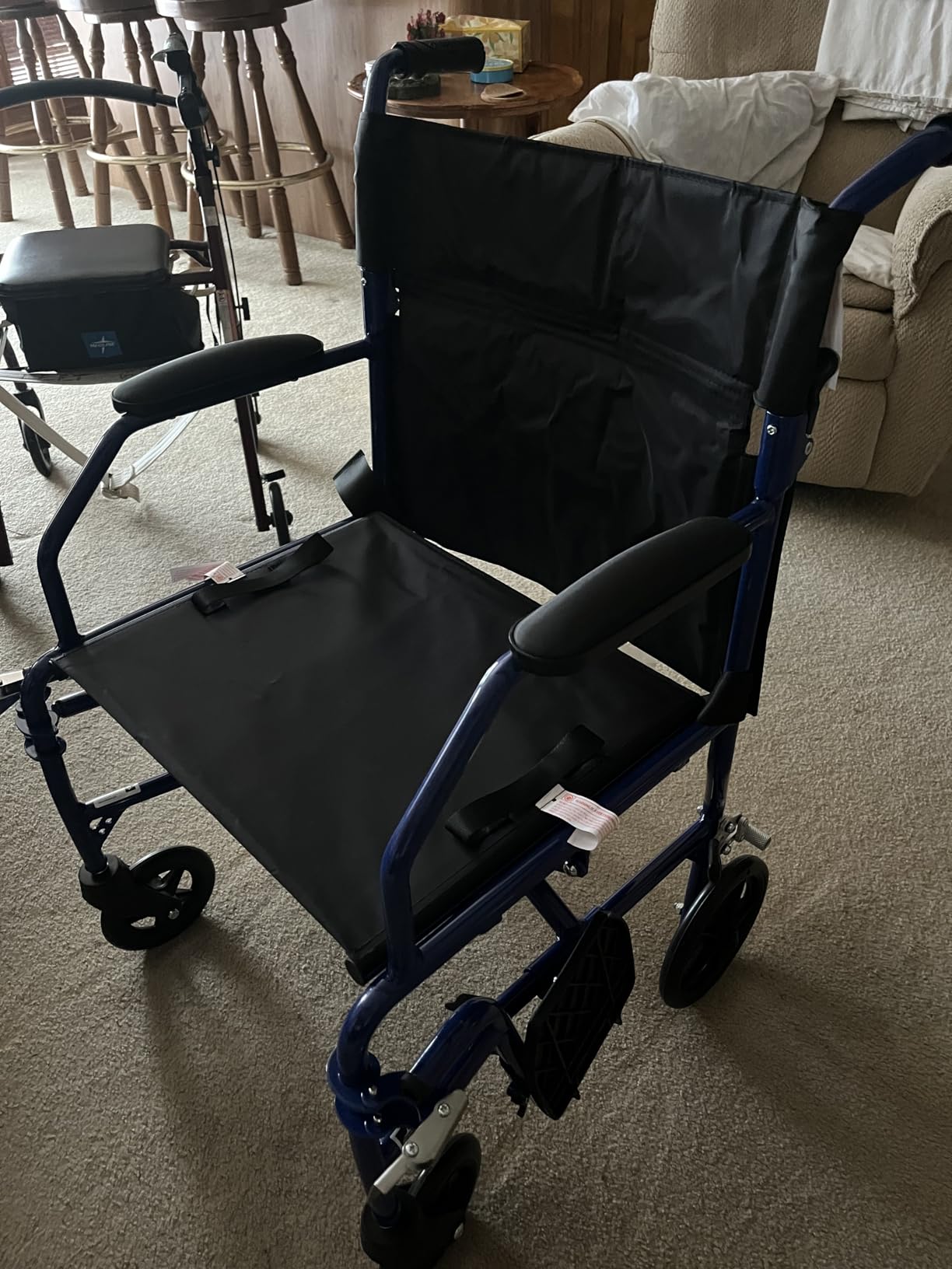 Medline Ultra Lightweight Transport Wheelchair for Adults, Foldable, 19-Inch Seat Width, Red Frame, Black Upholstery customer photo 1