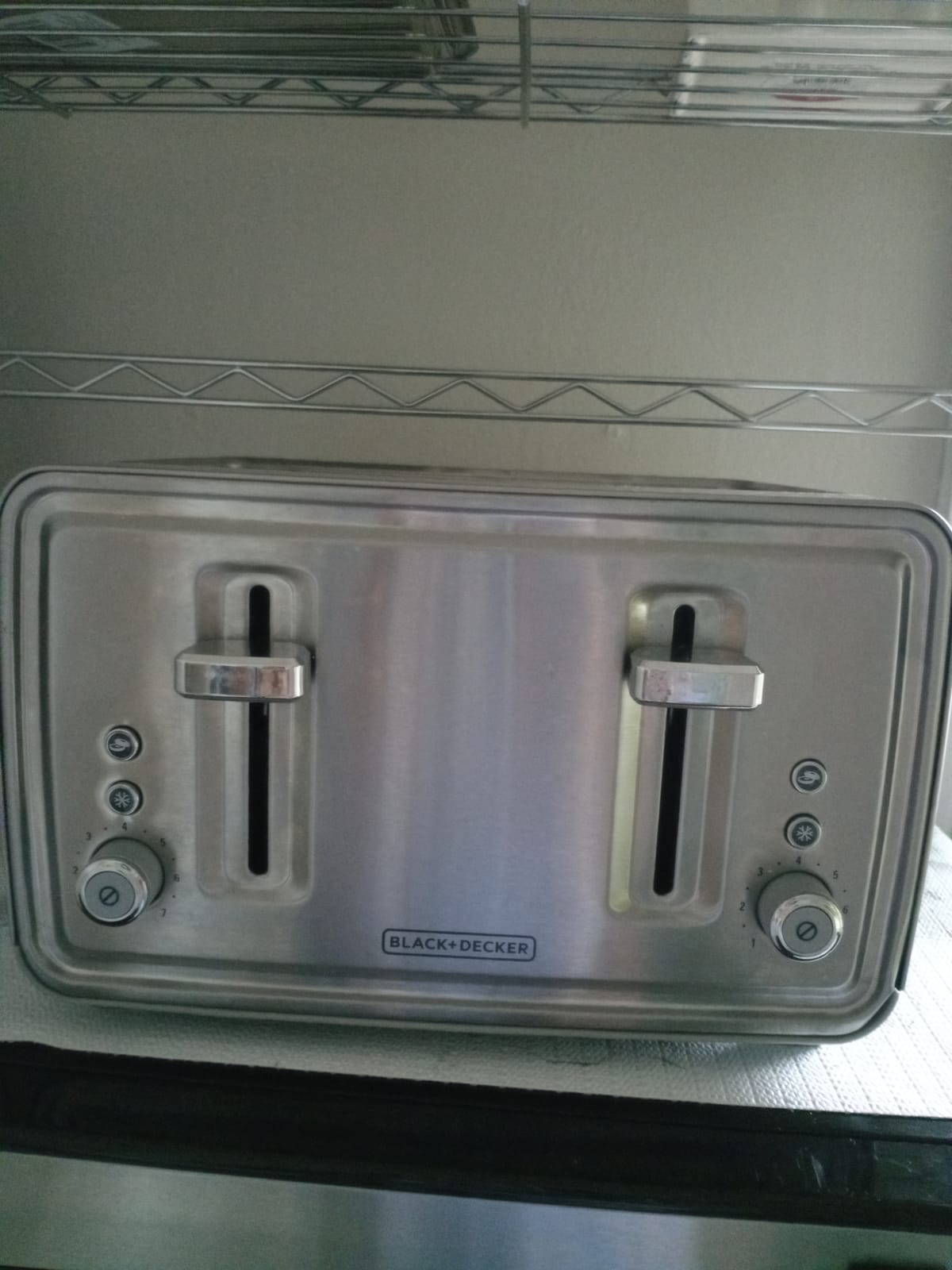 BLACK+DECKER 4-Slice Toaster with Dual Shade Controls | 4-slice toaster with dual shade controls, extra lift levers and pull-out crumb trays for easy cleanup. customer photo 1