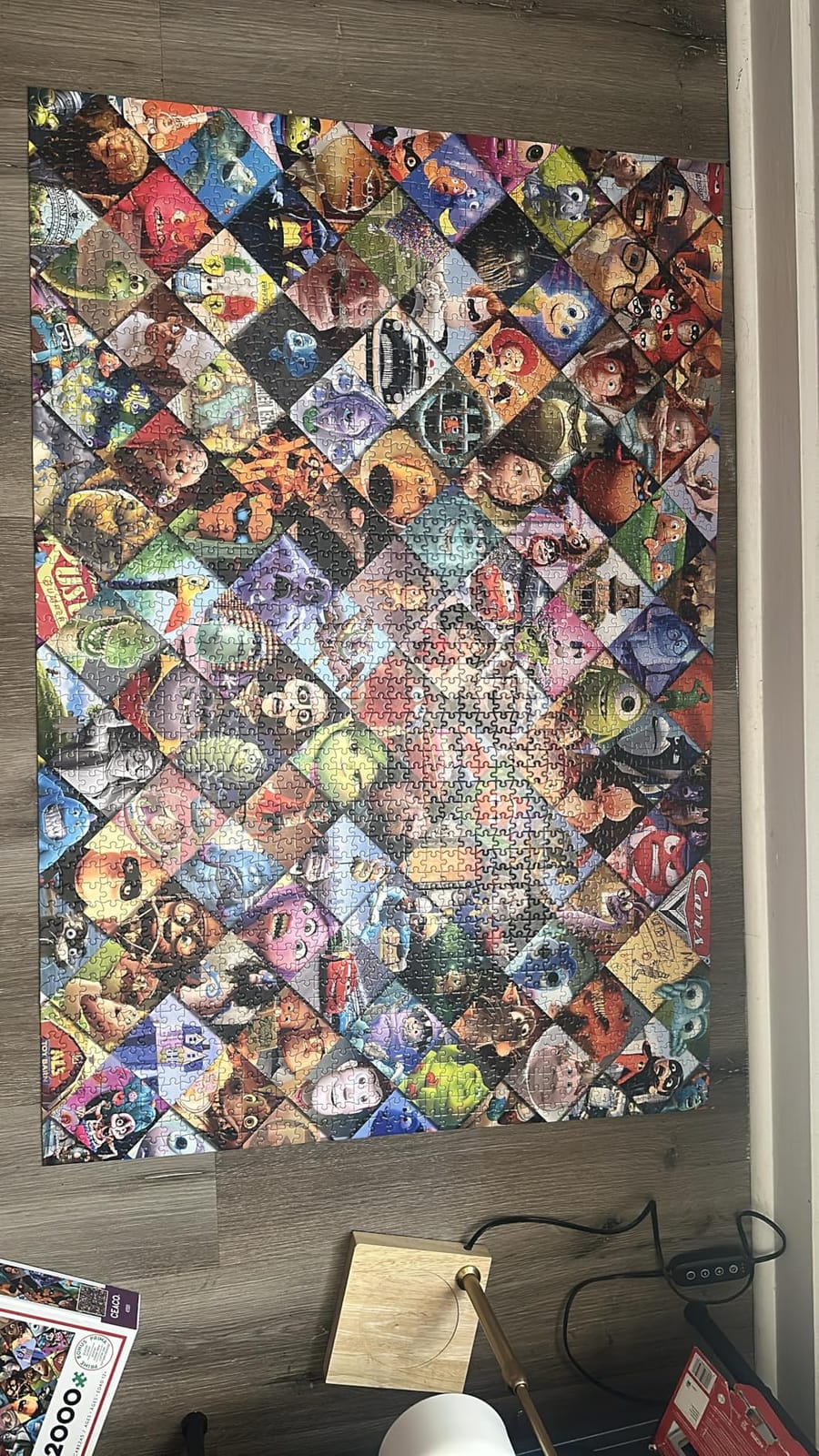 Ceaco - Disney/Pixar Clips - 2000 Piece Jigsaw Puzzle - Officially Licensed, Made in USA, Recycled Board, Finished Size 38.5 x 26.5 in, Includes Poster, Giftable, Frameable customer photo 1