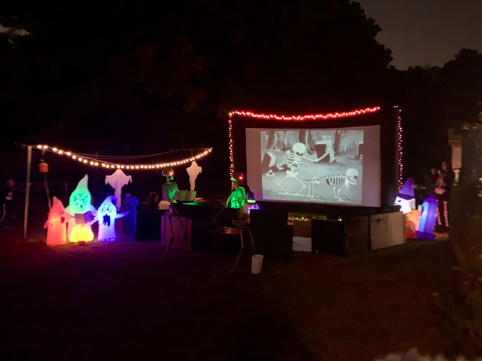 GYUEM 20 feet Inflatable Portable Projector Movie Screen - Huge Air-Blown Cinema Projection Screen Package with Rope, Blower, Tent Stakes - Front & Rear Projection, for Outdoor Party Backyard Pool Fun customer photo 2
