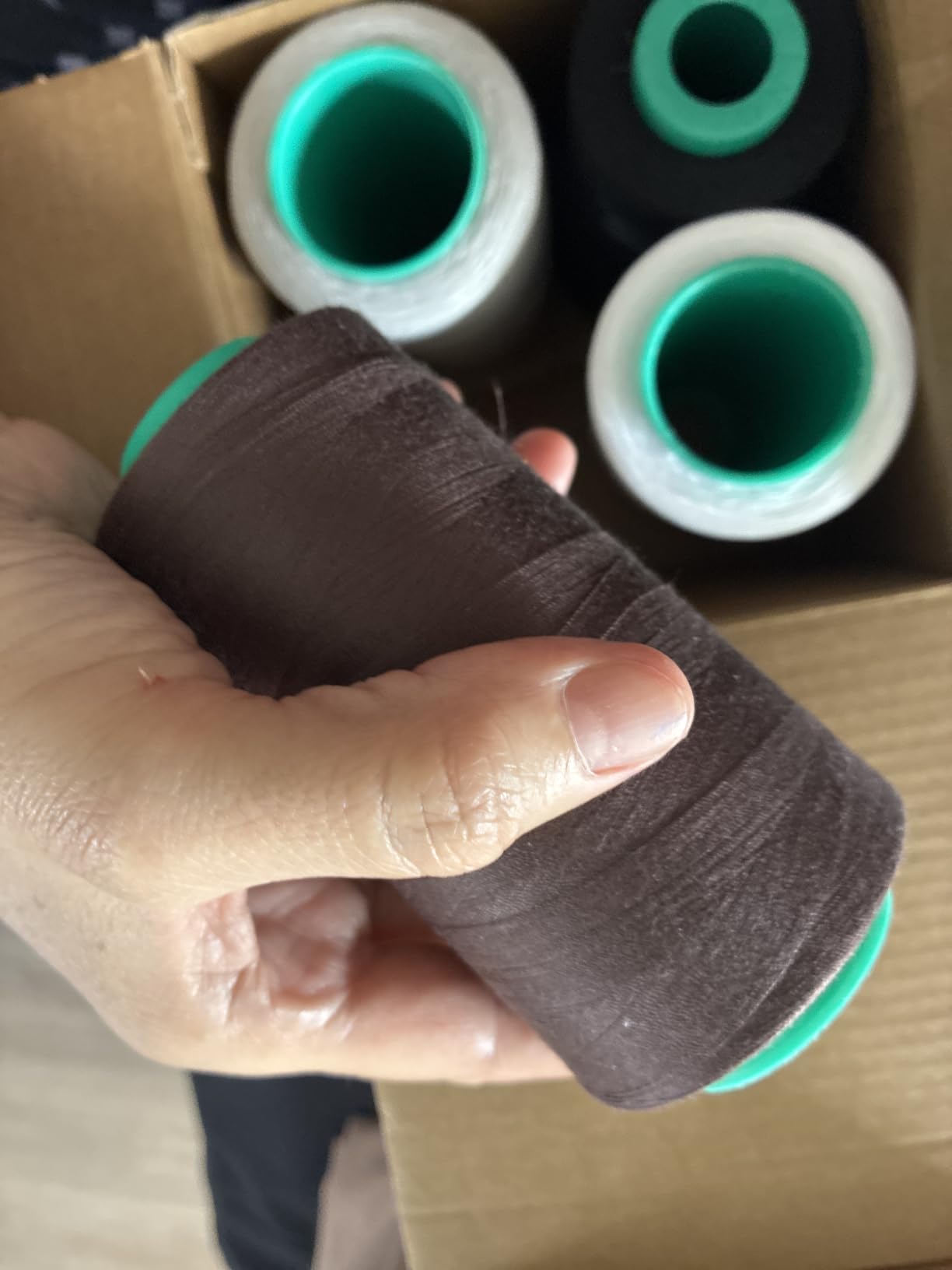 Serger Thread 4 Pack, All-Purpose Sewing Thread Polyester,4 Cones of 3000 Yards Each Spool,Cone Thread for Sewing Machine,140S/2 (Black,White,Brown,Grey) customer photo 1