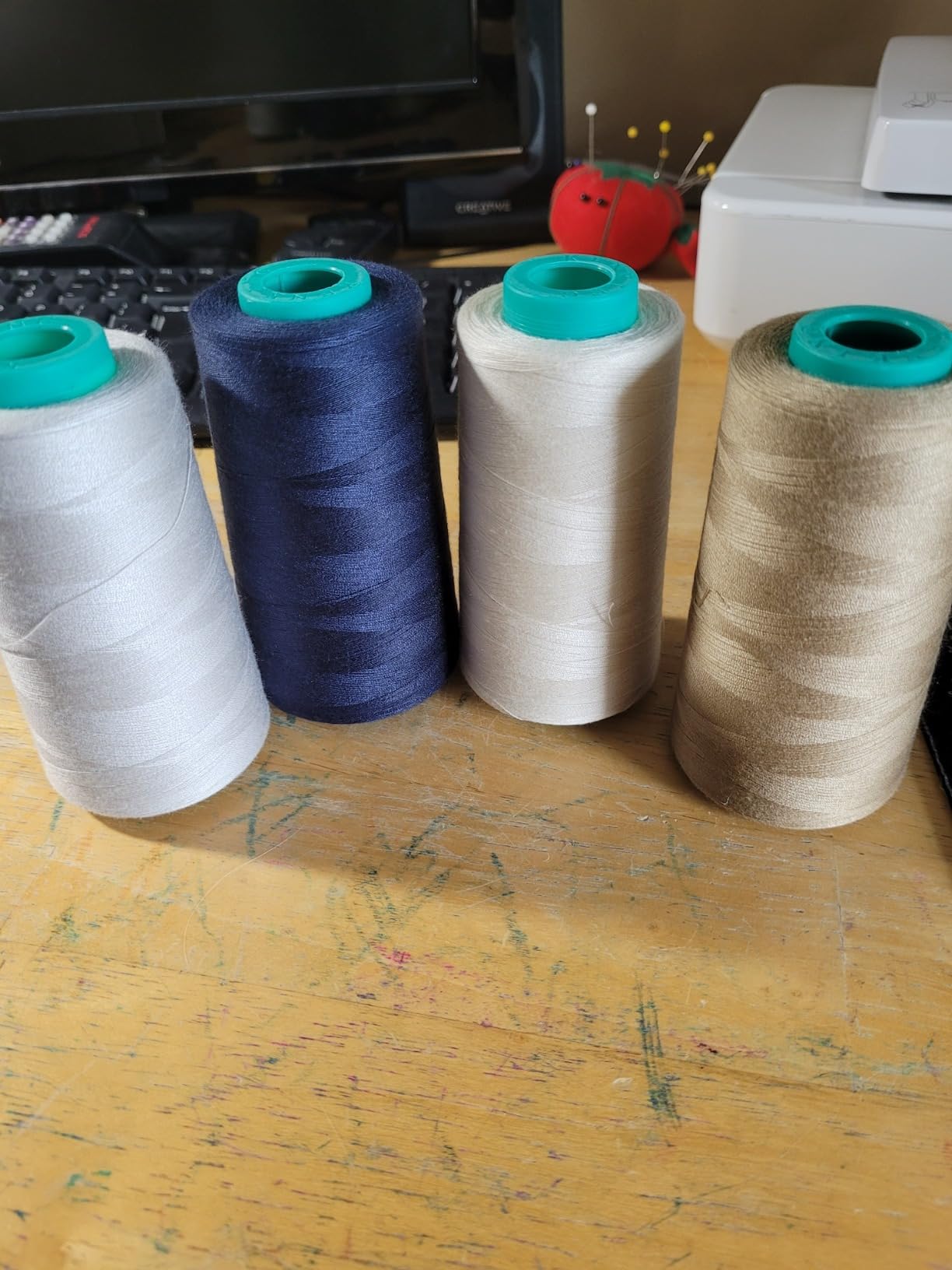 Serger Thread 4 Pack, All-Purpose Sewing Thread Polyester,4 Cones of 3000 Yards Each Spool,Cone Thread for Sewing Machine,140S/2 (Black,White,Brown,Grey) customer photo 2