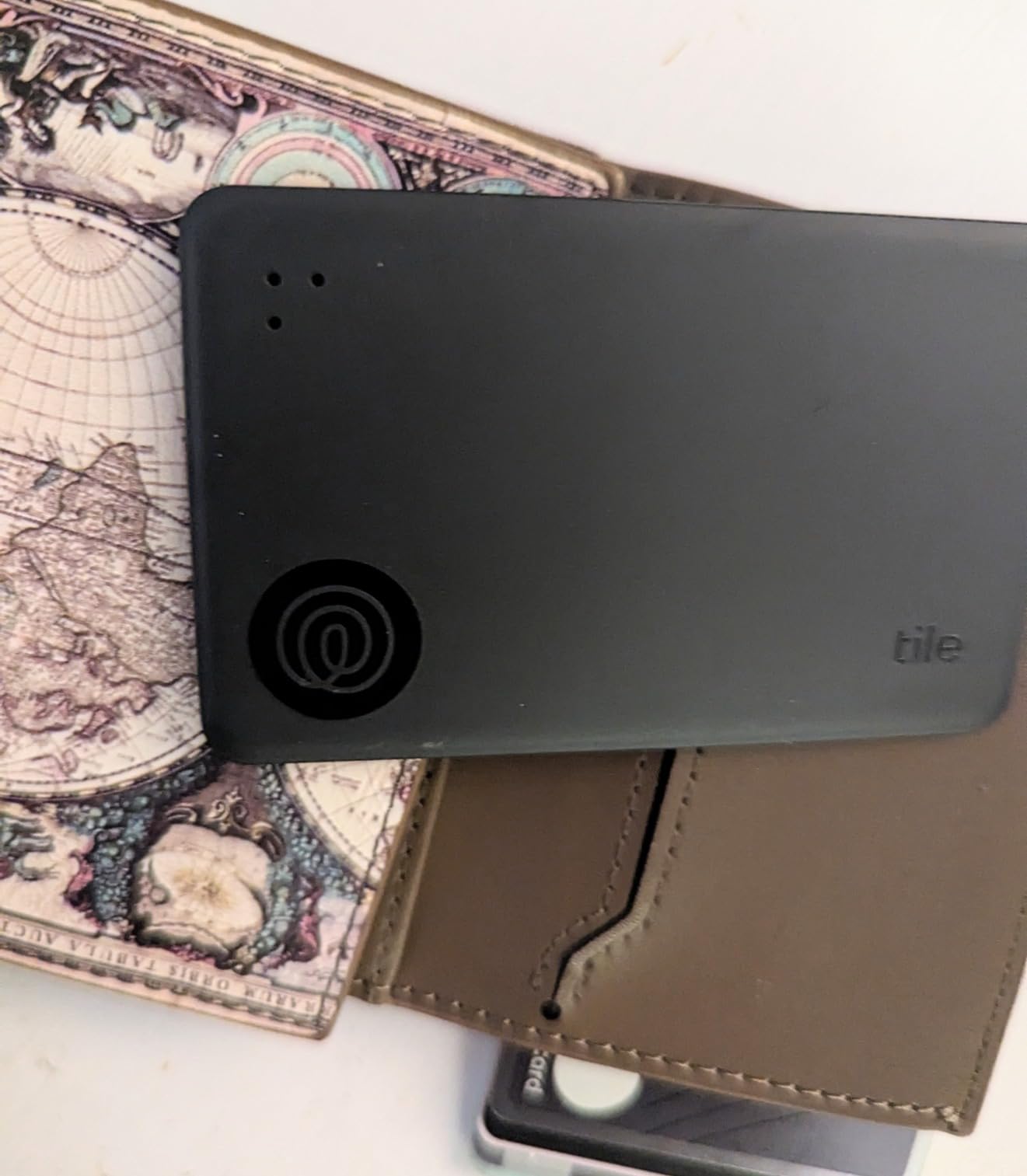 Life360 Tile Slim - Wallet Finder, Bluetooth Tracker and Item Locator for Luggage Tags, Passports and More. Both iOS and Android Compatible. Phone Finder. 1-Pack (Black) customer photo 1